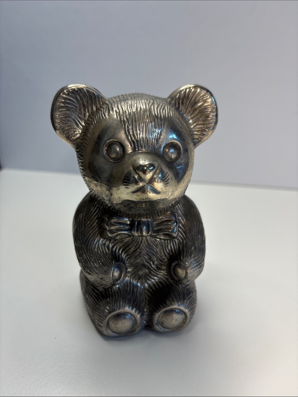 Metallic Silver colored Teddy Bear Coin Bank Piggy Ban Sculpture with Bow Accent